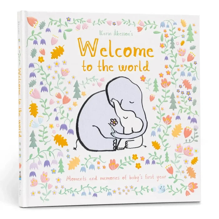 Book titled 'Welcome to the world' with illustrations of elephants and flowers on a white background