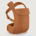 Brown baby carrier on a light gray background