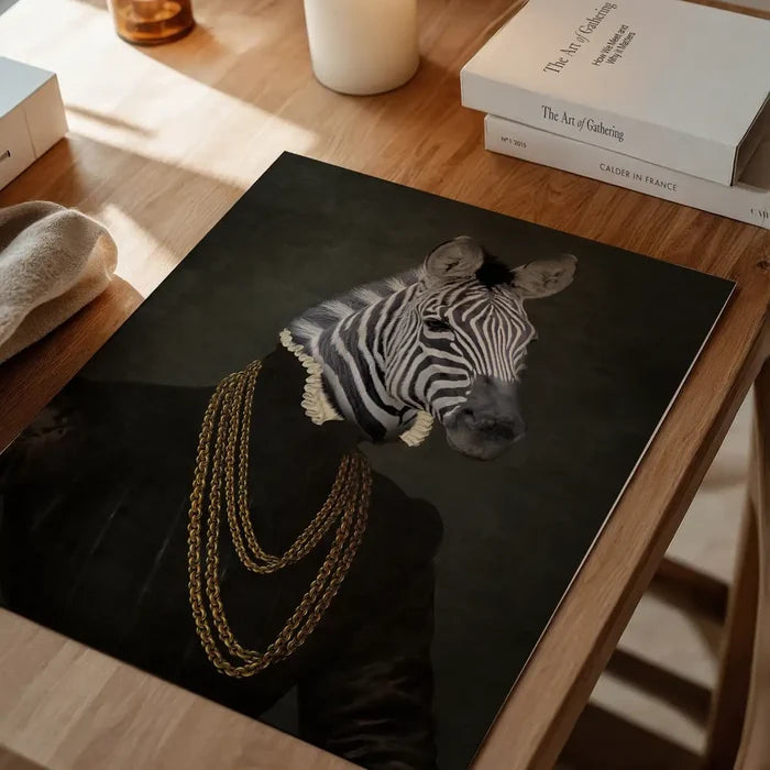 Zebra Portrait Print, quirky altered art print unframed on a home office desk